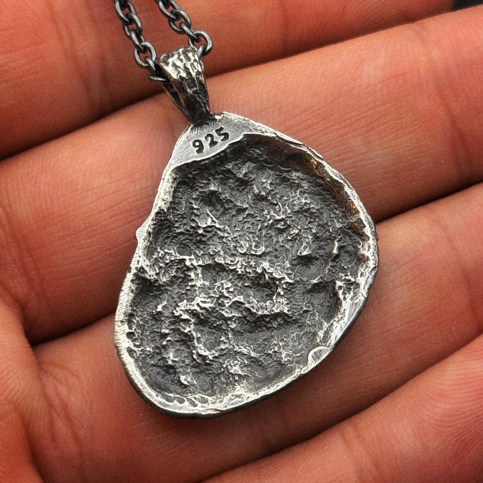 Minimal silver pendant on chain