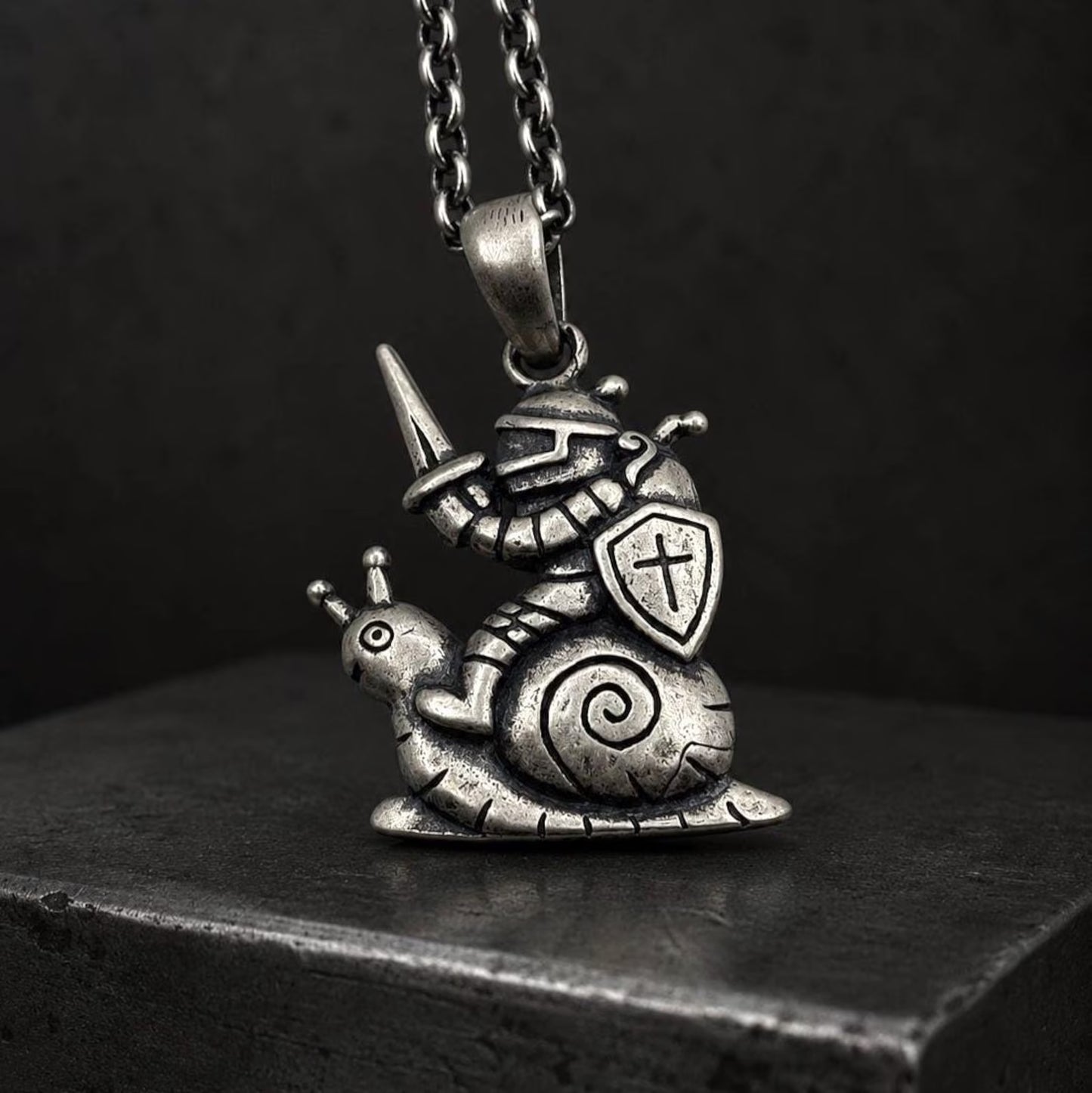 Medieval Knight Riding Snail Necklace