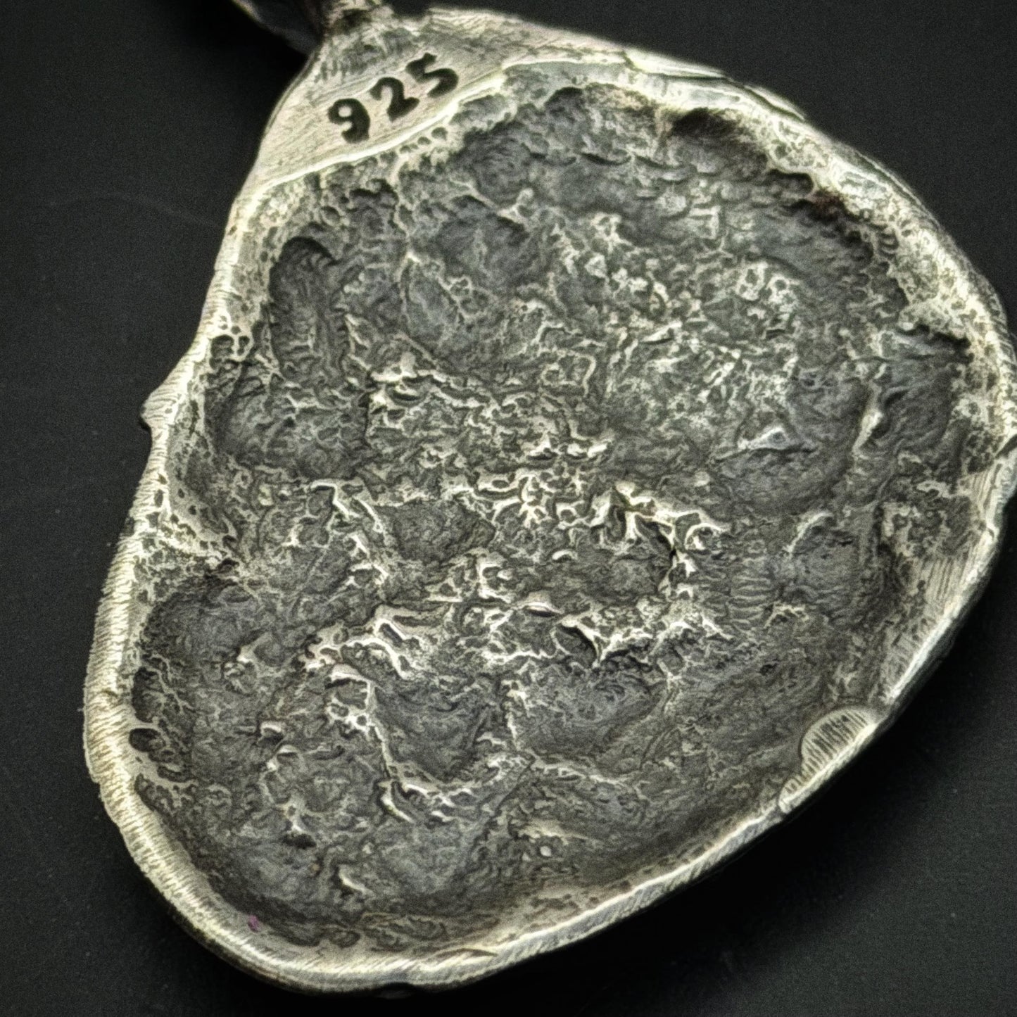 Necklace displayed on neutral background